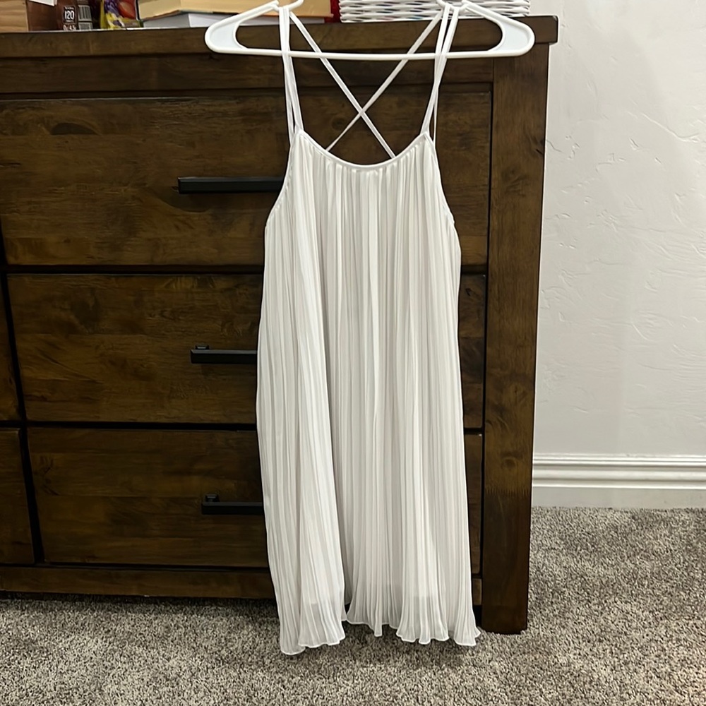 size xs white mini flowy dress super flattering not tight at all very simple